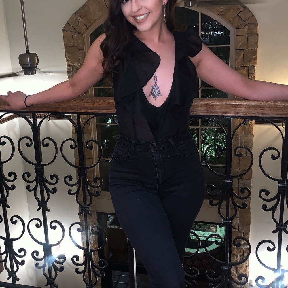 Black dramatic sheer bodysuit